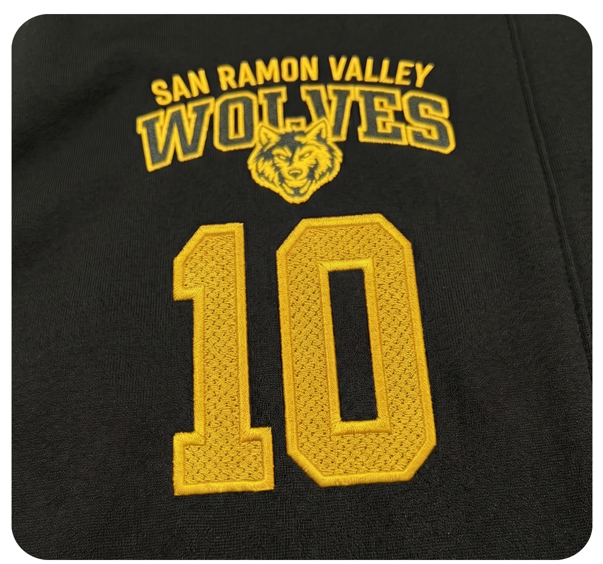 Custom team apparel with an embroidered player number