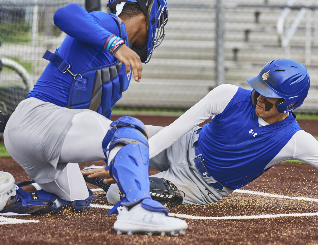 Baseball players wearing custom Under Armour baseball pants in knicker and relaxed fits