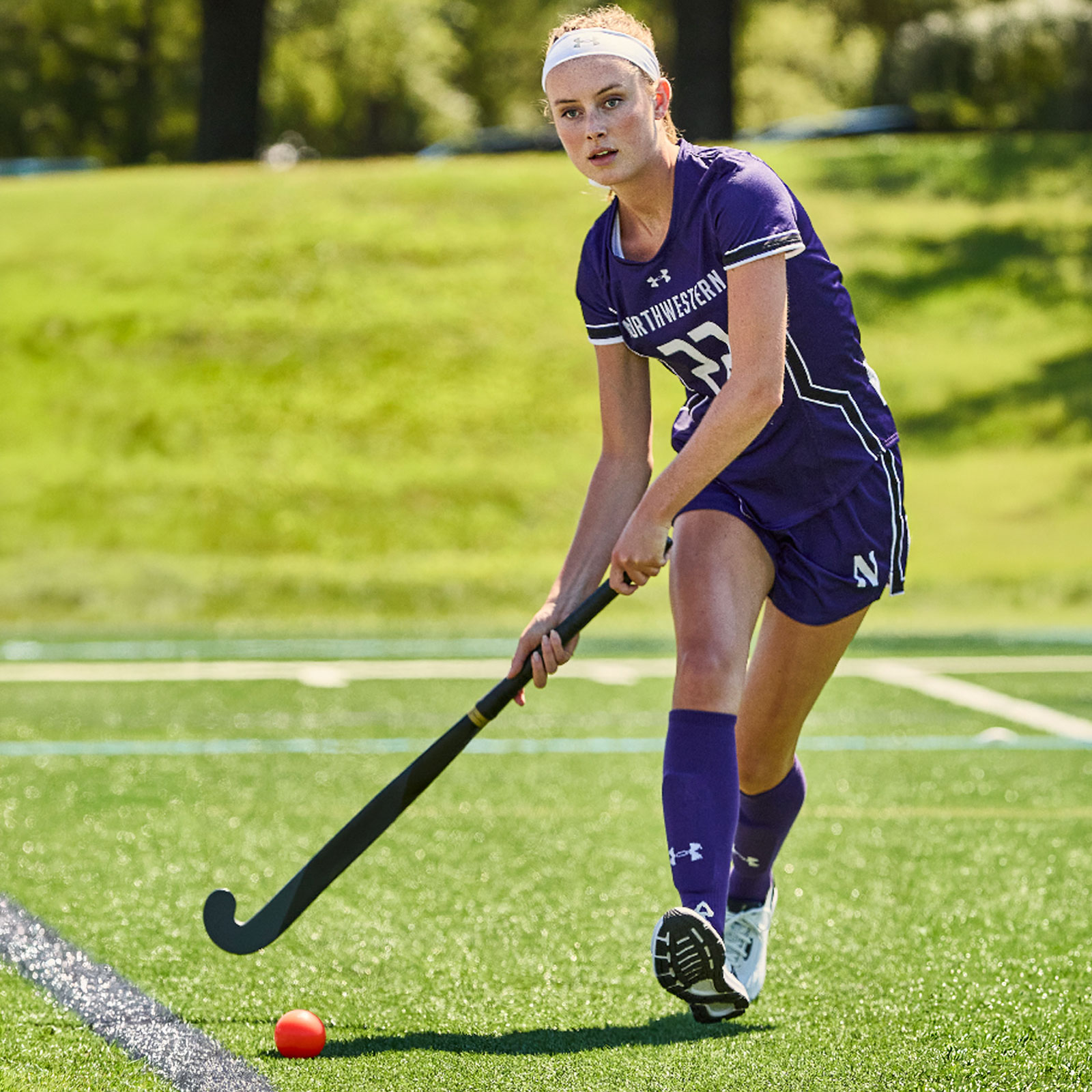 Image of a field hockey player in a custom uniform