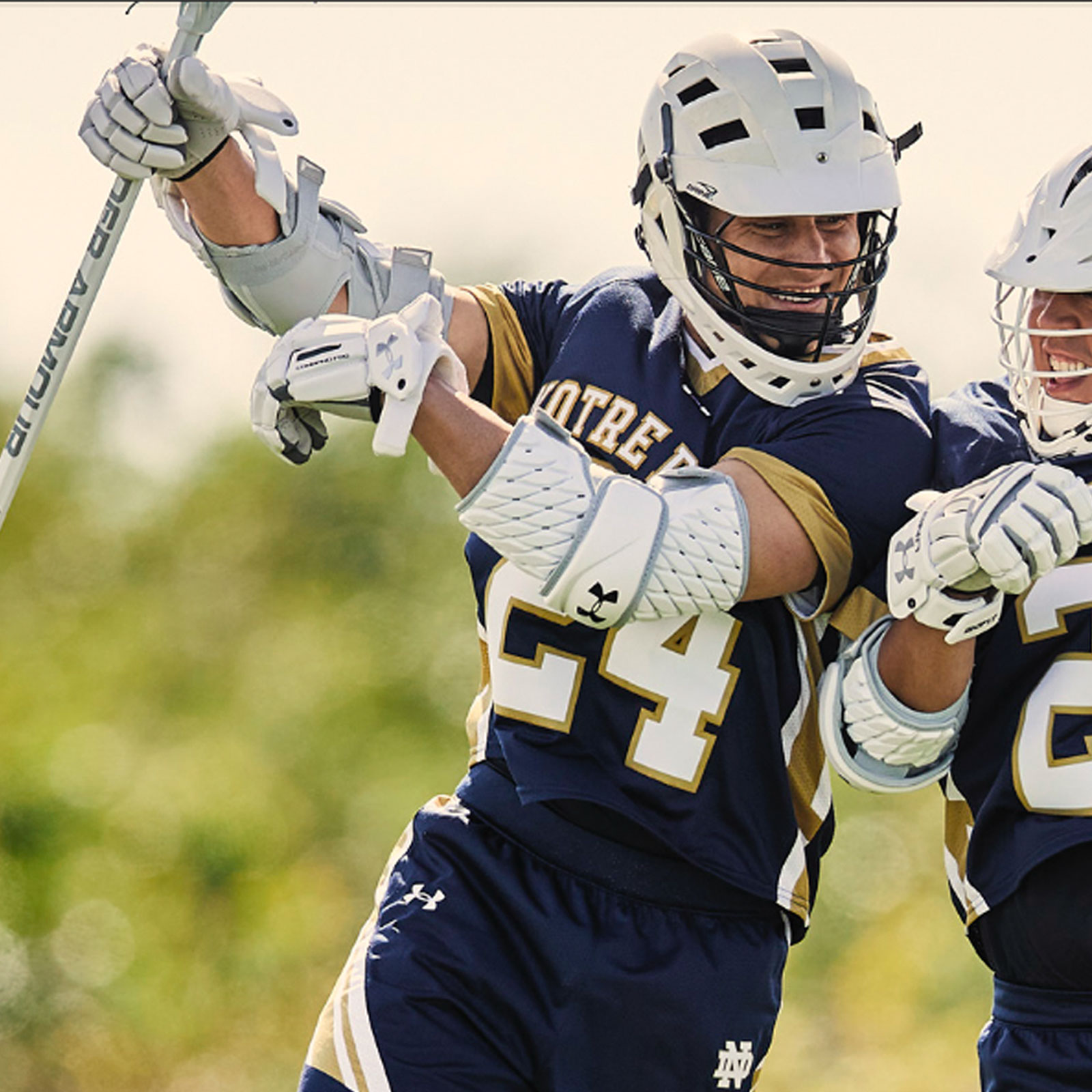Image of lacrosse players in custom uniforms