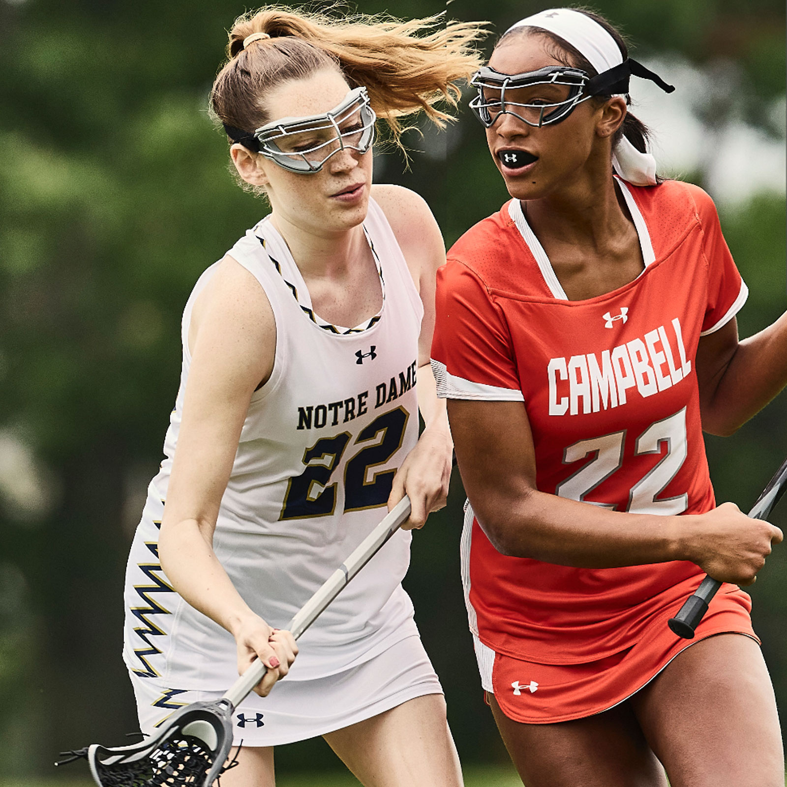 Image of a womens lacrosse player in a custom uniform